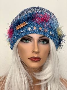 I Designed and Hand Knitted this Cotton Slouch, Hat, Beanie , Beret, Tam. Top gather pull style braided tie, allows you to open as needed to get pony tail / hair out. Bottom of the hat has a braided tie with different beads on ends, going through and allows adjustable fit.  Multicolors of spring & summer colors in novelty yarn around the bottom. Designed and Hand Knitted in California, USA. See All of My Original Designs Four Seasons Trendy Fine Hand Knits listed in My Etsy Shop:  " Hand Knits 2 Love":  Etsy.com/shop/handknits2love Hand Knits, Novelty Yarn, Blue Beanie, Crochet Knit Hat, Crochet Bucket Hat, Slouch Hat, Beanie Cap, Hat Beanie, Head Hair