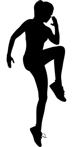 the silhouette of a woman is jumping in the air