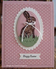 an easter card with a bunny in the grass