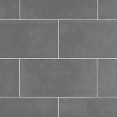 a black and white photo of a tile floor with no grouting on it