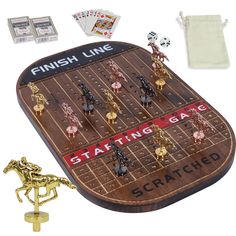 a wooden board game set with dices and cards