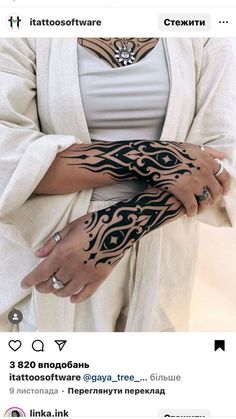 a woman with tattoos on her arm and arms is shown in an instagramture