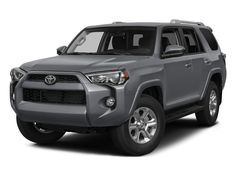 the front end of a gray toyota 4runner suv on a white background with no shadow