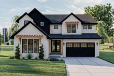 a white house with black roof and two garages in the front yard on a sunny day