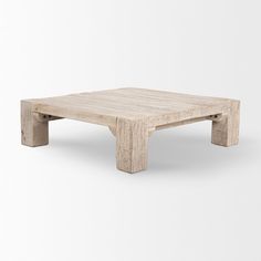 an unfinished coffee table on a white background