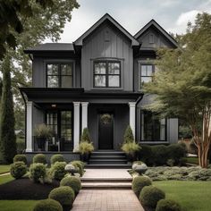 Black Rendered House Exterior, Black Roof Grey House, Dark Grey And Black House Exterior, Black Stucco House Exterior, Grey And Black House Exterior, Grey House Black Trim, House With Black Trim, Black Trim Exterior House, Spa Exterior