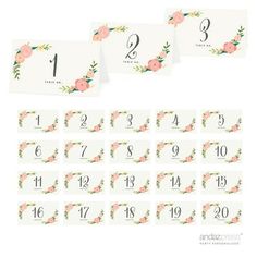 wedding table numbers with pink flowers and leaves