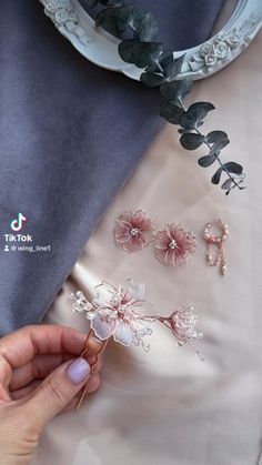 Handmade resin sakura flower hairpin in Japanese style. Transparent petals with pink gold wire. Perfect accessory for a touch of elegance and charm. #handmade #resin #sakura #flowerhairpin #JapaneseStyle #flowerjewelry Wedding Charms, Flower Hairpin, Blossom Jewelry, Floral Hair Clip, Jewelry Rose Gold, Half Saree Designs, Sakura Flower, Flower Diy Crafts, Flower Diy