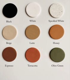 the different shades of eyeshades are shown on a white surface, including black, white, green, and red