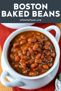 a bowl filled with baked beans on top of a table