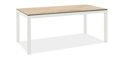 a white table with a wooden top and clear glass on the bottom, against a white background