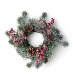 a christmas wreath with pine cones and red berries on the front is displayed against a white background