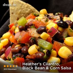 beans, carrots and corn are mixed together in a mixture to make a colorful salad