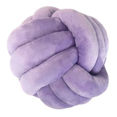 a purple knoted pillow on a white background