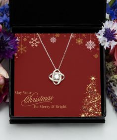 Message Card Jewel, Christmas Necklace Gift Message, Christmas Gift For Her Necklace, Gift For Mom Christmas Necklace, Christmas Necklace Silver Love Knot Christmas Necklace Gift With Message Card - Red 🎄The perfect gift for your loved one, friend, neighbor at Christmas🎄 How Do I Order? ✨ Select the style of necklace and whether you would like it gift wrapped or with a luxury box from the drop down menu ✨ Please be aware that you will need to add one item at a time to your basket ✨ Complete your order, sit back and relax until your necklace gift arrives - Love Knot Silver Necklace: Weight 0.11 oz A stunning .925 Sterling Silver necklace, AAAA grade cubic zirconia jewels set throughout the pendant, featuring a Love Knot design with a large AAAA grade cubic zirconia stone in the center. Th Jewel Christmas, Jeweled Christmas, Gift For Mom Christmas, Christmas Necklace, Mom Christmas, Christmas Gift For Her, Christmas Mom, Gift Message, Luxury Boxes