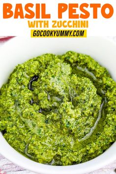 basil pesto with zucchini in a white bowl