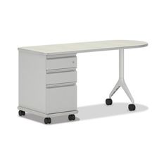 a white desk with three drawers on wheels