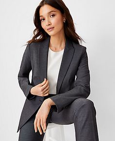 Elevate your workday wardrobe with the Ann Taylor Petite Long One-Button Blazer in Bi-Stretch, a perfect blend of style and comfort. This dark grey blazer is tailored to flatter with its refined four-way stretch fabric that maintains its shape while ensuring you stay comfortable from morning to evening.

- Size: Petite 4
- Color: Dark Grey
- Material: 66% Polyester, 28% Rayon, 6% Spandex
- Gender: Female
- Features: Peaked lapel, long sleeves with button-open option for styling versatility, one- Dark Grey Suit Women, Ann Taylor Outfits, Ann Taylor Outfit, Dark Grey Blazer, Grey Suits, Female Features, Dark Gray Suit, Grey Wool Suit, Blazer Suit Women