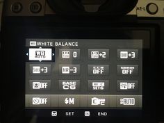 an electronic device displaying the white balance on it's display screen and instructions for how to use it