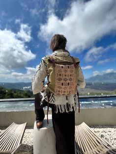 Comfy ethnic / boho / tribal style backpack made of natural canvas. Firm, durable, reliable. Decorated with embroidery by hand. It will serve you for many years. ▫️The hidden side has a pocket for your valuable items, keys and phone. Additionally there is a small pocket inside the main section. ▫️Closes with snap fasteners, two magnets on the sides. ▫️The length of the strap is adjustable. This duffel bag continues the series of shamanic clothing by «Ayaho». We aim to make unique items and care Artisan Backpack For Travel, Artisan Travel Backpack, Bohemian Leather Backpack For Everyday Use, Bohemian Leather Backpack For Everyday, Bohemian Leather Backpack With Adjustable Strap, Everyday Bohemian Leather Backpack, Traditional Backpack For Daily Use, Bohemian Beige Backpack, Bohemian Backpack For Everyday Use