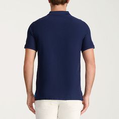 Versatile and stylish, the IZOD Advantage Performance polo combines comfort, quality, and fit. This own-it-in-every-color men's polo is designed for everyday wear with a classic 2-button placket, subtly darker trim, and a roll-resistant collar. Featuring a regular cut, our short-sleeve polo shirt for men is crafted from a naturally stretchy and cooling fabric with UV-15 sun protection that pulls moisture from the skin and dries quickly for added comfort. Our polo is made from a breathable blend Blue Polo Collar Top With Placket, Navy Collared Cotton Tops, Navy Fitted Tops With Collared Neckline, Navy Fitted Top With Collared Neckline, Blue Cotton Polo Shirt With Placket, Navy Fitted Collared Tops, Fitted Navy Collared Tops, Fitted Collared Navy Tops, Business Casual Cotton V-neck Tops