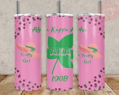 three pink tumblers with green leaves and polka dots on them, all in the same color