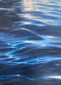 an abstract painting of blue water with sun reflecting on it