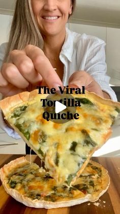 a woman is holding up a slice of quiche with the words, the virtual top - down quesadilla