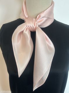 "Luxurious light Sakura pink natural mulberry silk medium square scarf, size: 65 cm x 65 cm / 26 in x 26 in. Soft, smooth, and lustrous silk charmeuse fabric, breathable and skin-friendly feels very soft and comfortable to wear. Can wear it on both sides which will give different feel and look. Can style in many ways: can wear this scarf as a soft neck scarf, as a hair tie, as a headband scarf, as a wrist scarf, as a purse accessory. Or style it in any way you want with your own sense of creativity! Suitable for all seasons and is a great gift idea for special occasions.  Care Instructions: Pure silk is a type of organic, natural and delicate fabric, please avoid washing if it's not particularly dirty. Gently hand wash cold/lukewarm with mild detergent, natural air dry. Stored in a cool, d Baby Pink Silk, Pink Silk Scarf, Headband Scarf, Neck Scarf Tying, Plain Scarves, Charmeuse Fabric, Silk Neck Scarf, Scarf Hair, Small Scarf