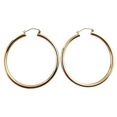 14 Karat Yellow Gold Large Circle Hoop Earrings This classic set of large circle hoops were crafted from 14K yellow gold and will look beautiful on anyone! Diameter: 46.36mm Width: 3.28mm Weight: 3.6 dwt/ 5.6 g Hallmark: 585 Very good condition, professionally polished. Will come packaged in a gift box or pouch (when possible) and will be shipped U.S. Priority Mail Insured. MM091724/17KCS Look Beautiful, Gold Texture, Jewelry Earrings Hoops, Gold Hoop, Gift Collections, Gold Hoop Earrings, Vintage Earrings, Priority Mail, Jewelry Earrings