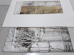 two drawings are shown on top of each other in an art gallery, one is white and the other is black