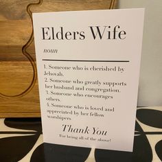 a sign that says elders wife on it