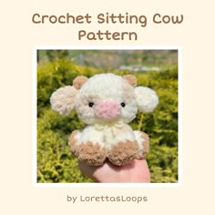 a hand holding a small stuffed animal in it's left hand with the text crochet sitting cow pattern