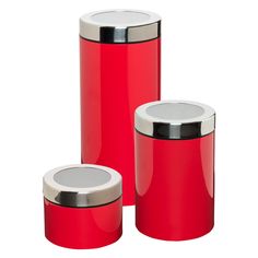 three red canisters sitting next to each other