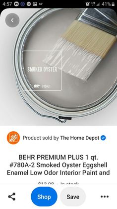 a can of paint with a brush on top of it and the words smudger sold by the home depot below