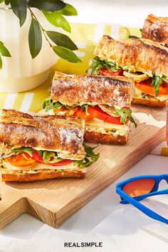 three sandwiches on a cutting board with the words healthy summer dinner ideas that are perfect for hot days