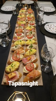 a long table with many different types of food on it