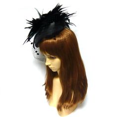 Feather Veil Fascinator Hair Clip Hat #1294 Item Features : .Rich and soft real feather headpiece .Beautiful decoration fascinator hat with birdcage veil .Vintage classic design .Long metal hair clip to put it on your hair .Perfect costume hair accessory for weddings, parties, night out, Halloween and other special events .Great for women of all ages Item Specifications : .Handmade in Korea .100% brand new with high quality .Feather, veil, fabric and metal clip .Measures approx 8.66 inches (22 c Fitted Black Fascinator With Feather Trim, Fitted Party Headpiece With Ostrich Feathers, Black Ostrich Feather Headpiece, Black Feather Hair Accessories For Party, Fitted Black Headpiece With Feathers, Black Ostrich Feather Trim Headpiece, Fitted Black Feathered Headpiece, Ostrich Feather Trimmed Costume Hat For Wedding, Black Feathered Costume Hats And Headpieces For Royal Ascot