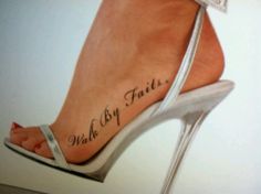 a woman's foot with a tattoo on it that reads, wish by faith