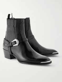 CELINE HOMME's Chelsea boots combine traditional Western style with its signature rock 'n' roll energy. This pair has been crafted in Italy from sleek lizard-effect leather and features silver-tone accents along the almond toes and buckles, simply remove the harness straps for a more streamlined look. Luxury Chelsea Boots With Rubber Sole For Derby, Luxury Cap Toe Chelsea Boots For Derby, Luxury Leather Chelsea Boots With Buckle Closure, Luxury Black Derby With Leather Sole, Luxury Black Calf Leather Derby Shoes, Chelsea Boots Men Outfit, Chelsea Boots For Men, Boots Men Outfit, Boots Outfit Men