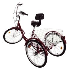 a black and white bicycle with a basket on the front wheel, parked against a white background