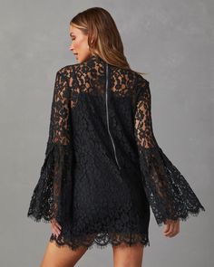 We’re head over heels for the She’s All That Lace Long Sleeve Mini Dress. Delicately woven floral lace fabric, long bell sleeves and an elegant, high neckline give this mini length silhouette all the pretty and playful finishing touches. Wear it during wedding season with a classic pair of heels. High Neckline Long Bel Lace Long Sleeve Mini Dress, Long Sleeve Lace Mini Dress, Black Long Sleeve Mini Dress, Floral Lace Fabric, Black Mock Neck, Long Bell Sleeves, Long Sleeve Dress Formal, Heels High, Lace Long Sleeve