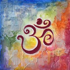 an om sign painted on the side of a wall in red and yellow colors with swirls