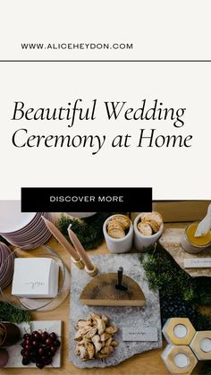 beautiful wedding ceremony at home with flowers, candles and other items on the counter top