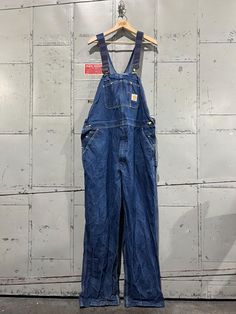 Good vintage condition. Clean. Marked 42x32. Please review measurements as some vintage items fit smaller than modern sizing. Measurements taken with garment laid flat: 22" across the waist 23" across hips 31" inseam, from intersection to hem 14.5" rise, from intersection to top of waist Please send a message if you have any questions. Double check measurements and inspect all pictures carefully before purchasing. Orders ship via USPS. All sales are final, we do not accept returns.  Follow on In Carhartt Bibs, Bib Overalls, Blue Denim, Gender Neutral, Overalls, Vintage Items, Adult Outfits, Blue, Clothes