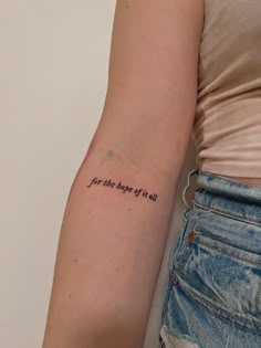 a woman's arm with a tattoo saying for the right of all