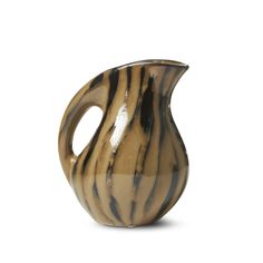 a brown and black striped vase on a white background