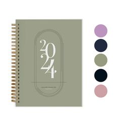 a spiral notebook with the numbers twenty and forty on it, surrounded by color swatches