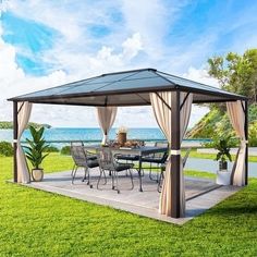 a gazebo sitting on top of a lush green field