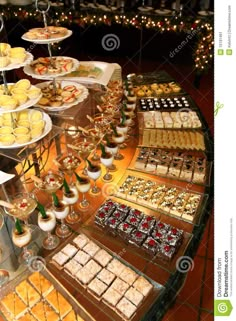 an assortment of desserts and pastries on display